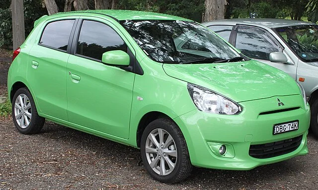 Bright green Mitsubishi Mirage