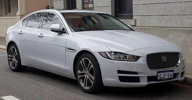 Silver Jaguar XE parked on a street