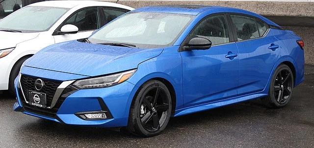 Blue 2021 Nissan Sentra in a car lot