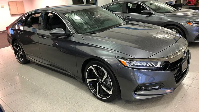 Silver Honda Accord in a showroom