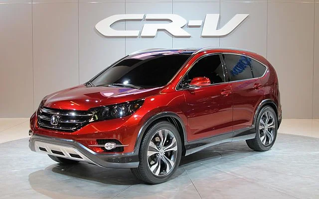 Red Honda CR-V in a showroom