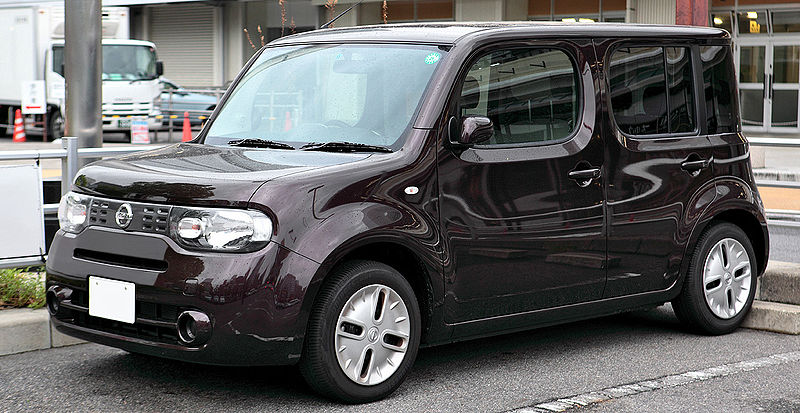 maroon Nissan Cube