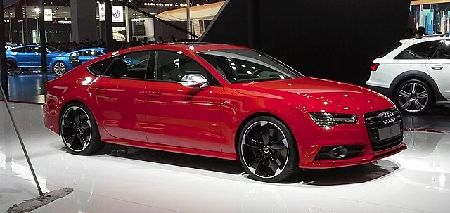 Red Audi S7 in a showroom