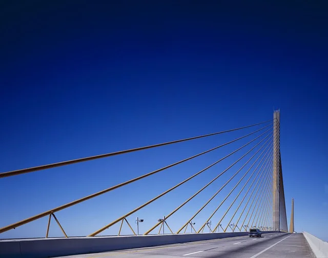 Car driving over a Florida bridge