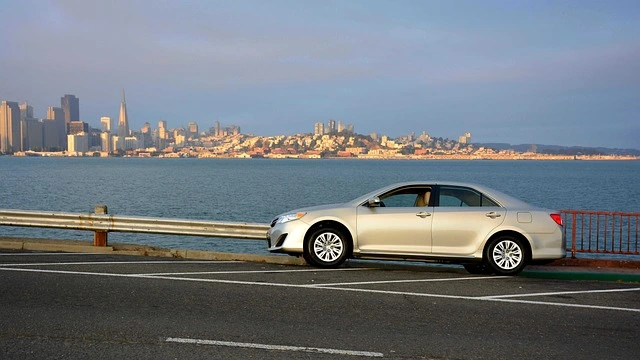 Camry next to a bay