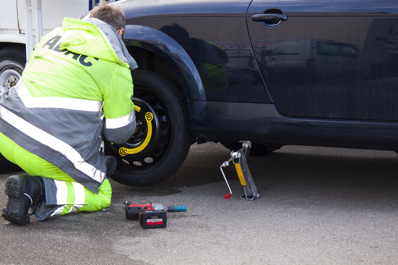 Person changing a tire