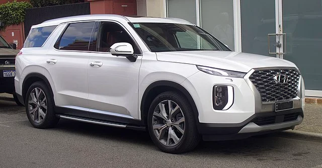 White Hyundai Palisade on a street