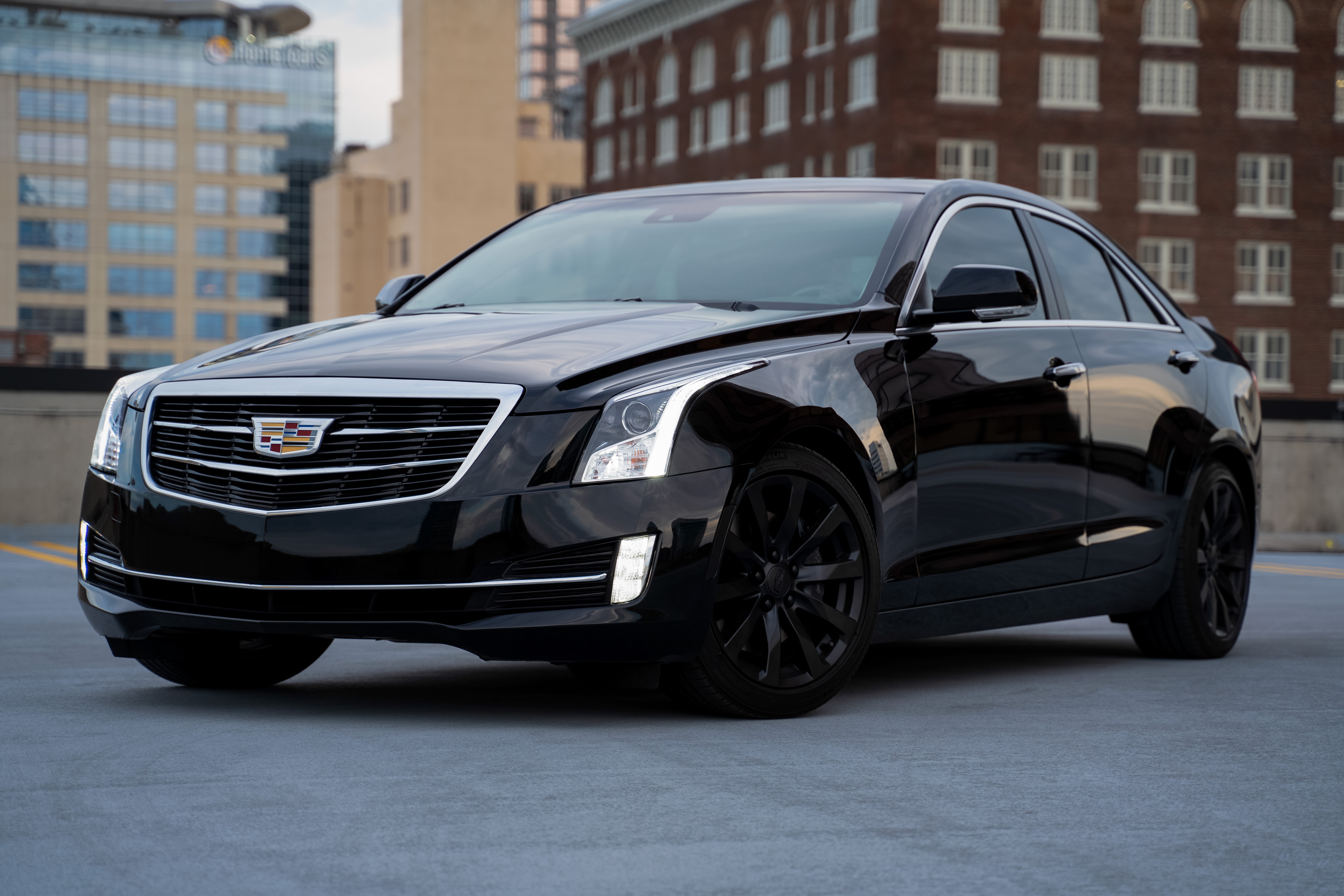 black cadillac vehicle